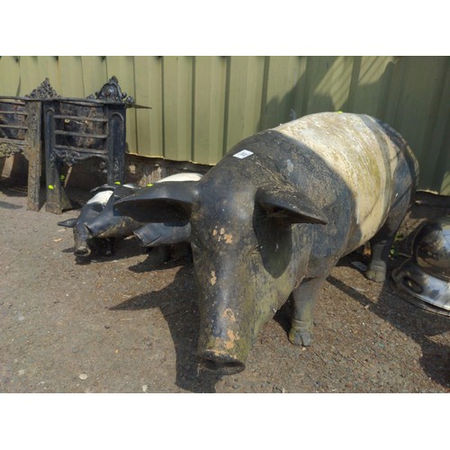 93 - 4 x  plastic/fibreglass black and white pig ornaments L94cm H45cm 