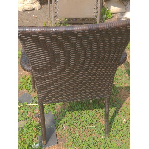 99 - set of six Rattan stacking garden chairs 