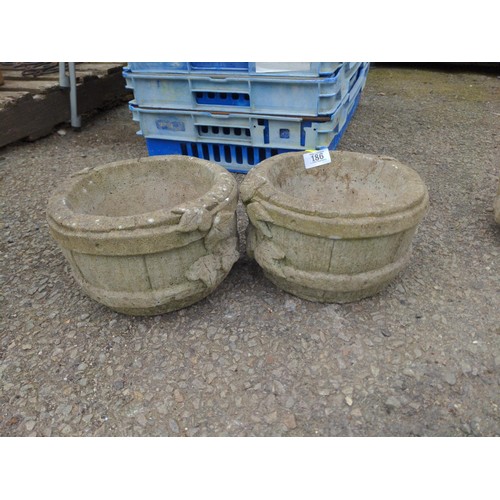 186 - 2 x small concrete barrel style planters D26cm x H14cm