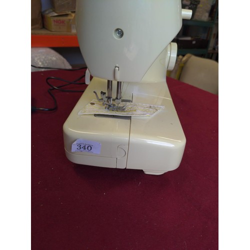 340 - Modern electric singer sewing machine 8280