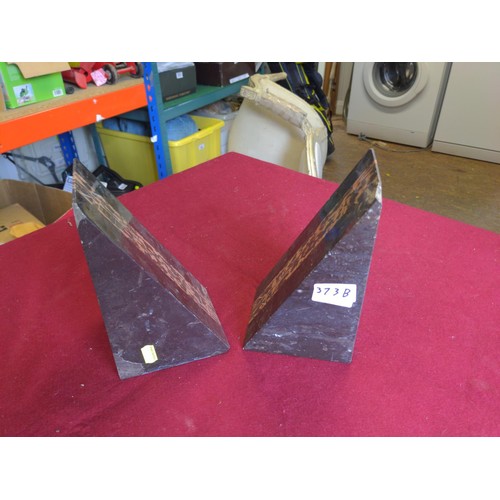 373B - Pair of polished stone pyramid style books ends.