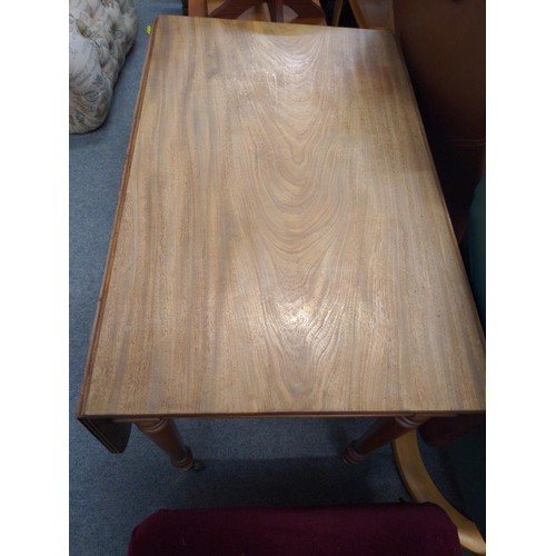 399 - Double leaf folding occasional table with single drawer and casters on turned legs. W81.5 D 52.5/ 11... 