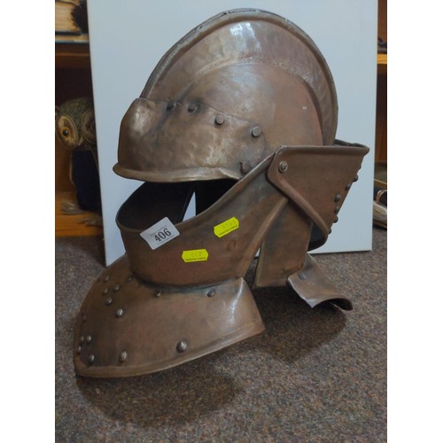 406 - Replica of a medieval Knights helmet with intricate metal work and general close to actual size.