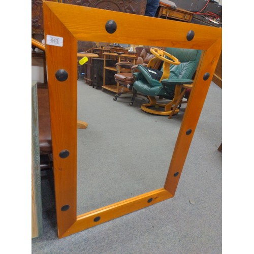 443 - Pine framed mirror 64cm x 87cm & a framed bevelled mirror 43cm x 85cm.