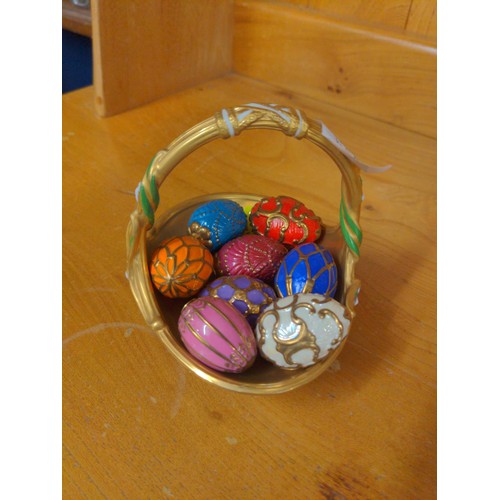 462 - Continental style ceramic eggs in basket