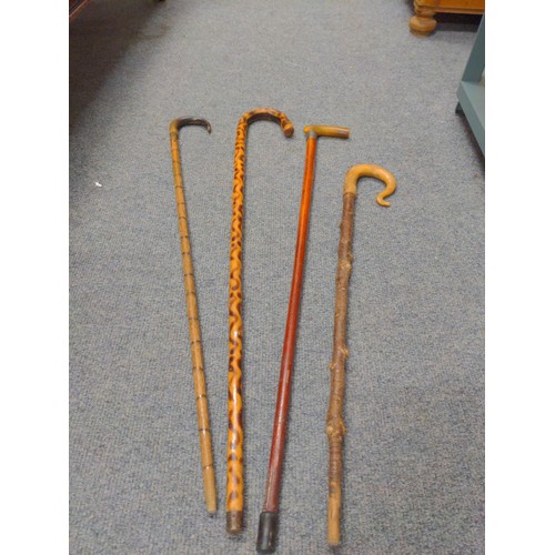 488 - 4 walking sticks, inc. Silver collared etc.