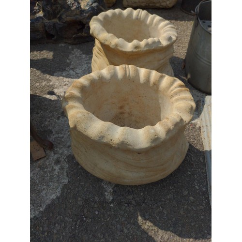 48 - Two small concrete sack planters W31cm x H23cm