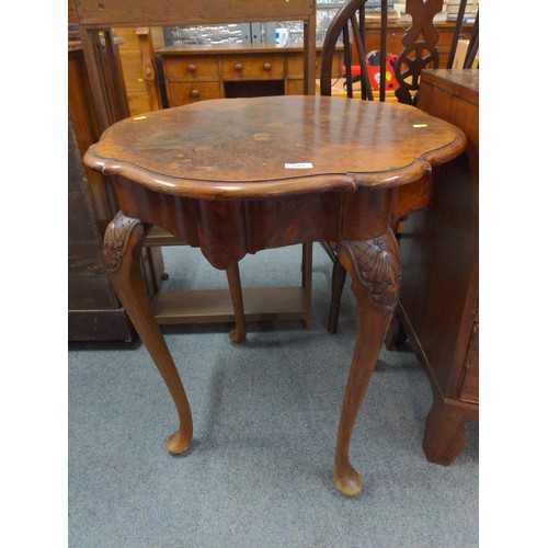 509 - Burr walnut circular occasional table, on cabriole supports. D69cm H77cm