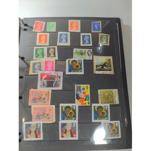 679 - Blue folder of British and world mint and used stamps & some first day cover, part filled