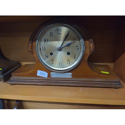 553 - Two oak admiral's hat mantle clocks: one with presentation plaque dated 1933 (missing glass & be... 