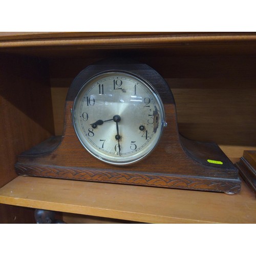 553 - Two oak admiral's hat mantle clocks: one with presentation plaque dated 1933 (missing glass & be... 