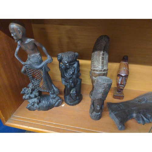 554 - Collection of African hardwood carvings.