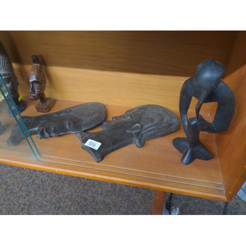 554 - Collection of African hardwood carvings.