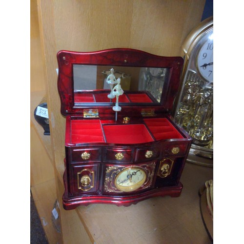 574 - Shelf of 5 assorted clocks & one musical music box.