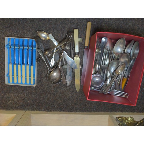 604 - Box of assorted silver plated flatware.