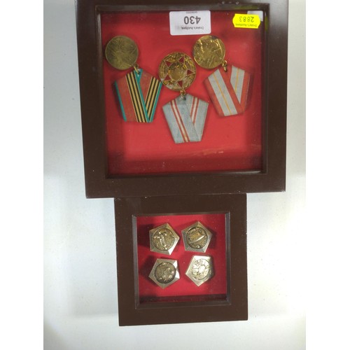 838 - Framed soviet medal trio and framed set of four space badges