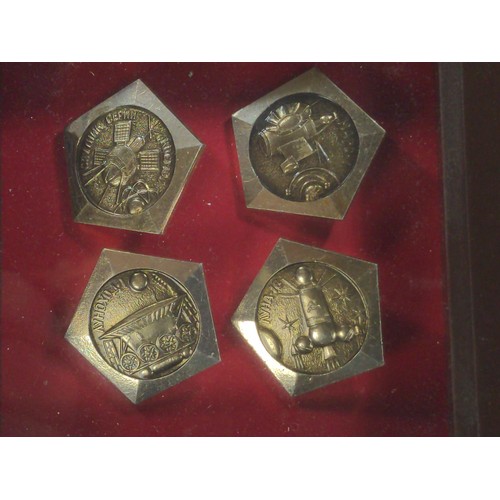 838 - Framed soviet medal trio and framed set of four space badges