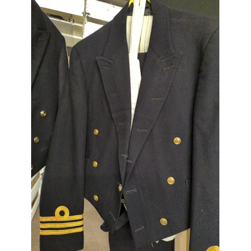 618 - Two full suits plus two short jackets from Royal Navy issue.