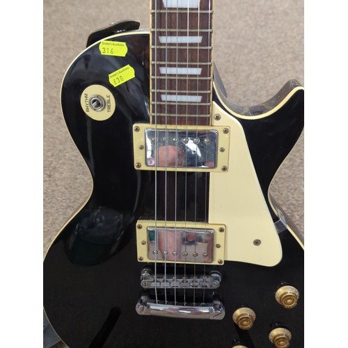 642 - Westfield Gibson Les Paul copy in black with strap.