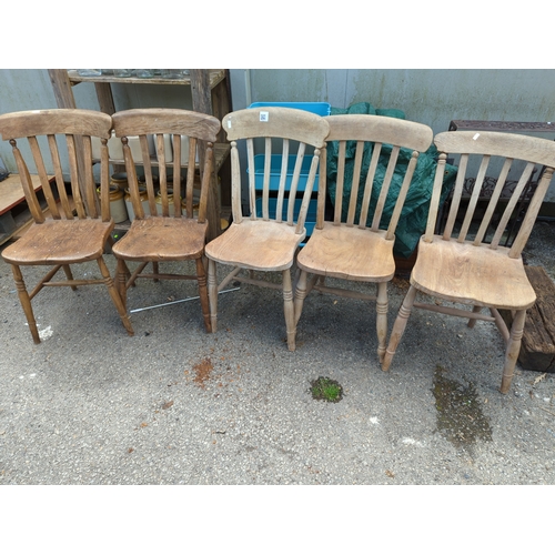 841 - 5 elm seated kitchen chairs. Some with damage/repair.