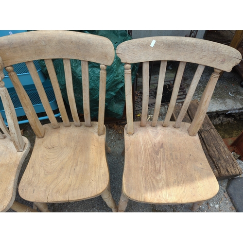 841 - 5 elm seated kitchen chairs. Some with damage/repair.