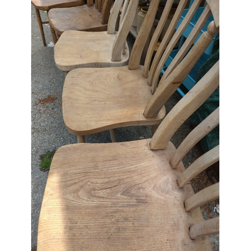 841 - 5 elm seated kitchen chairs. Some with damage/repair.