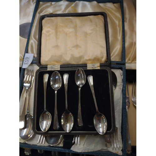 653 - Three boxed sets of flat ware, spoons, spoons and forks and fish cutlery.