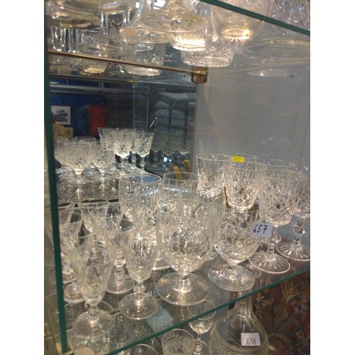 657 - Two shelves of mixed crystal inc, Royal Albert, Edinburgh , wine glasses, candle hilders etc.. 