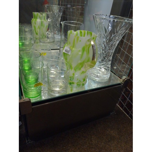 660 - Shelf of mixed glass ware inc, coloured jug, crystal vase and some glasses.