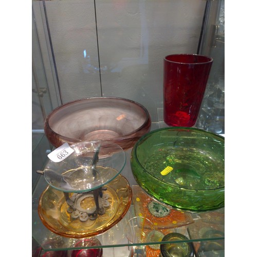 663 - Two shelves of mixed glass ware, inc, bowls, vases dishes etc.. in various colours and designs.