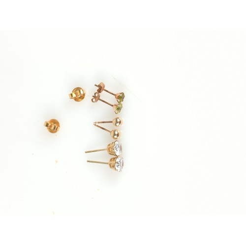 723 - 3 pairs of yellow metal earrings testing positive for 9ct gold. With one pair on 9ct butterflies. Gr... 