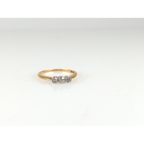 724 - Diamond trilogy ring on 18ct gold 2.16g