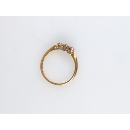 724 - Diamond trilogy ring on 18ct gold 2.16g