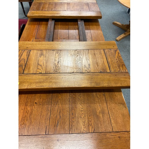 491A - Large rustic farmhouse style dining table. Thought to sit 10 + people. With two extra leaves