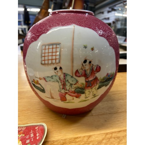 593 - Chinese c20 famille rose ginger jar with characters to base. 20cm high