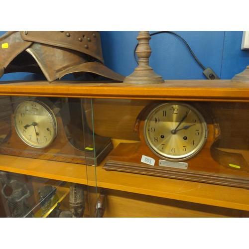 443 - Two oak admiral's hat mantle clocks: one with presentation plaque dated 1933 (missing glass & be... 