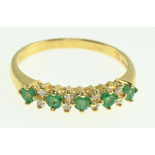 566 - Emerald and diamond ring set in 18ct gold, size P1/2, gross weight 3.22 grams