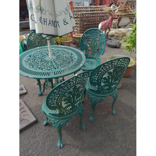 117 - Cast iron green garden bistro table 4 x chairs and Moet parasol 