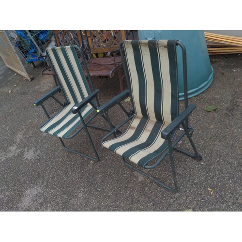 139 - 2 x fold up garden deck chairs green and white stripe