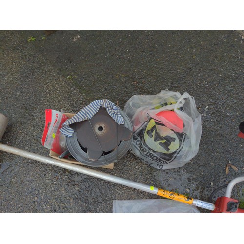 180 - Jonsered GR260 petrol strimmer with accessories and manual