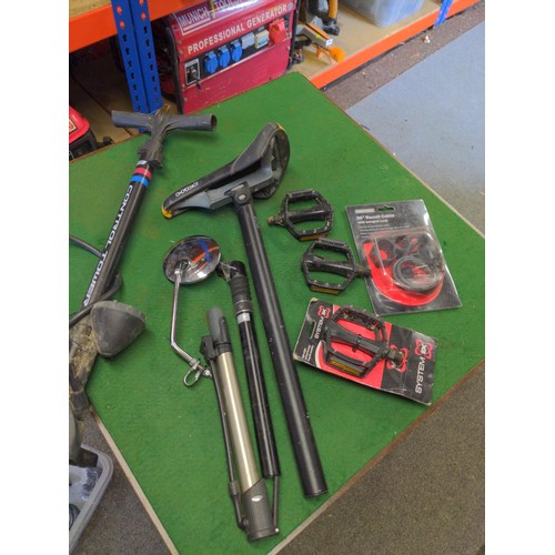 240 - Selection of cycling items Inc saddles, peddles, seat posts, pump Etc.. 