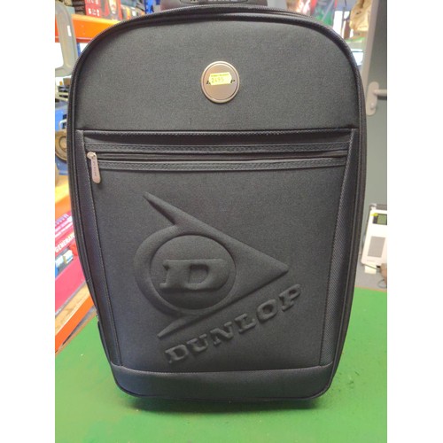 254 - 3 graduated Dunlop canvas travel cases 