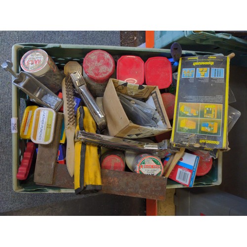 296 - Contents of green crate inc. assorted fixings, staple gun, paint brushes Etc..