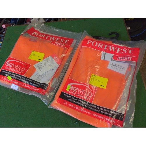 318 - 2 x Pairs of Portwest XL orange work trousers 