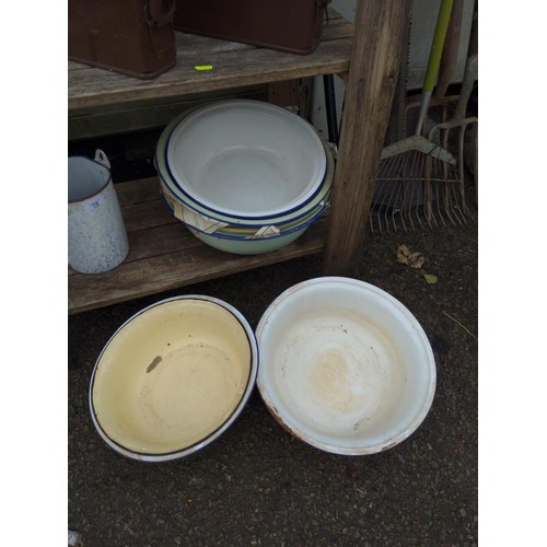 73 - Enamel cream separator with a collection of large enamel bowls 