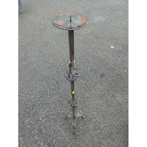 82 - wrought iron candle stand with cast iron fire crate