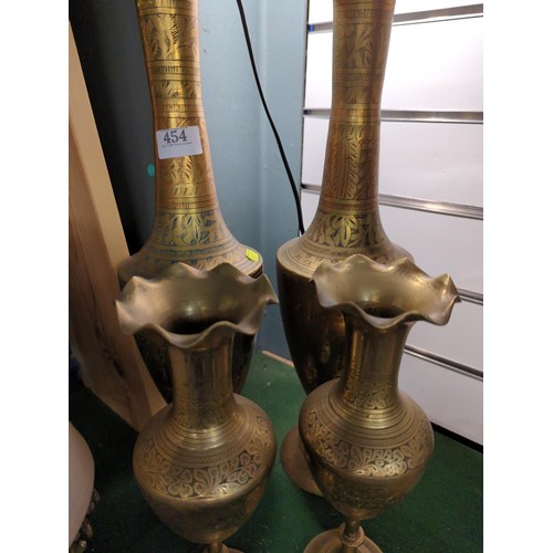 454 - 4x (in 2 pairs) of Indian style brass vases. Tallest H55cm