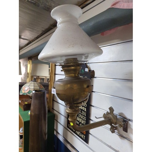 480 - Pair of wall mounted brass paraffin lamps converted to electric, one with missing shade & flue. ... 