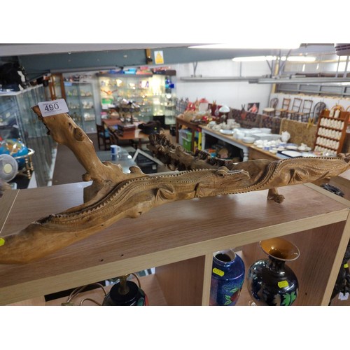 490 - Hardwood carved branch, decorated with Crocodilia. L83cm D40cm