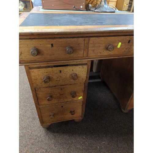 513 - Early C20 pedestal desk, with flanked 3 drawer units under single large drawer. W113cm D59cm H76cm